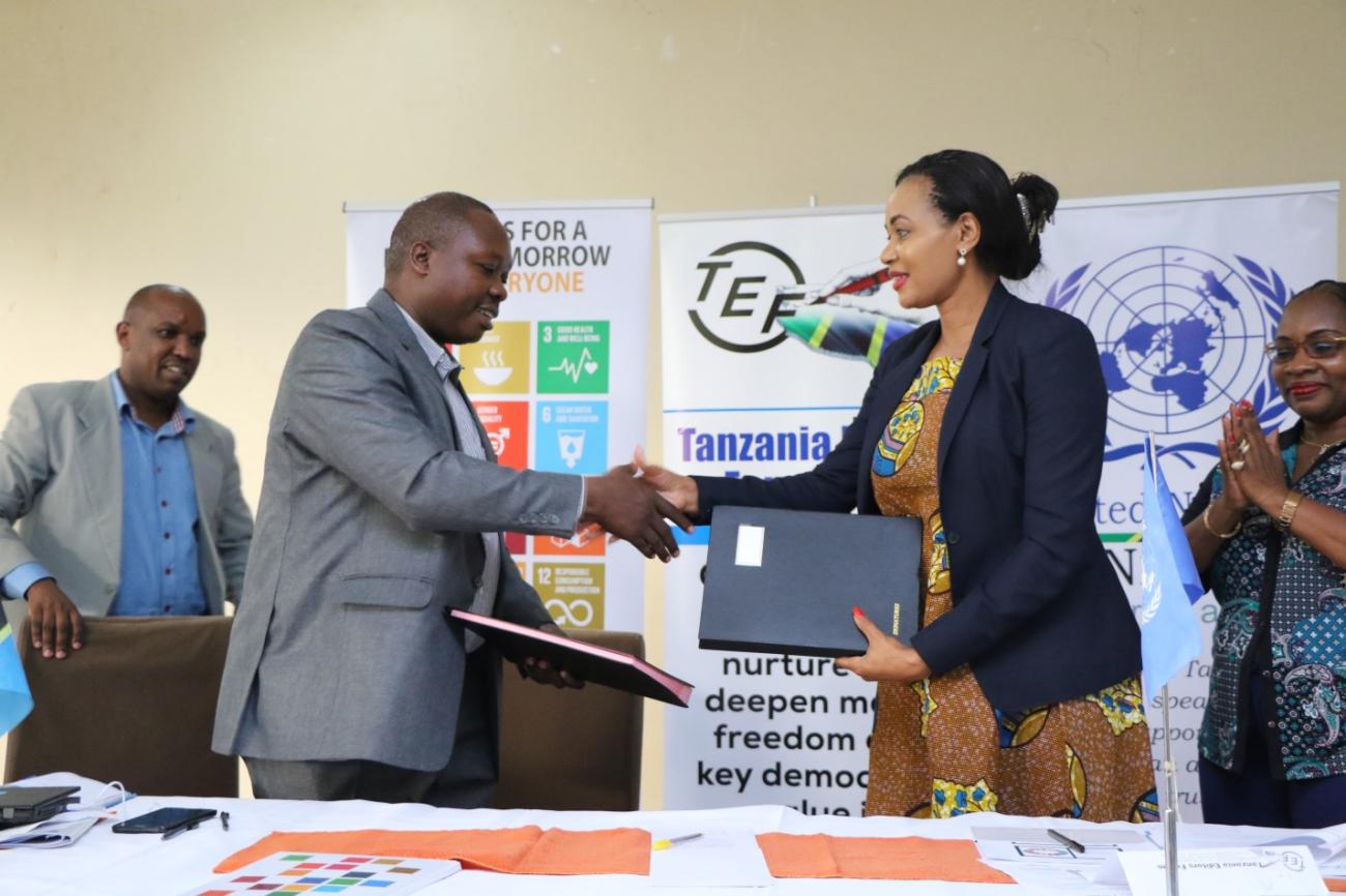 Mr. Deodatus Balile (left) and UN Communications Specialist, Ms. Hoyce Temu (right)