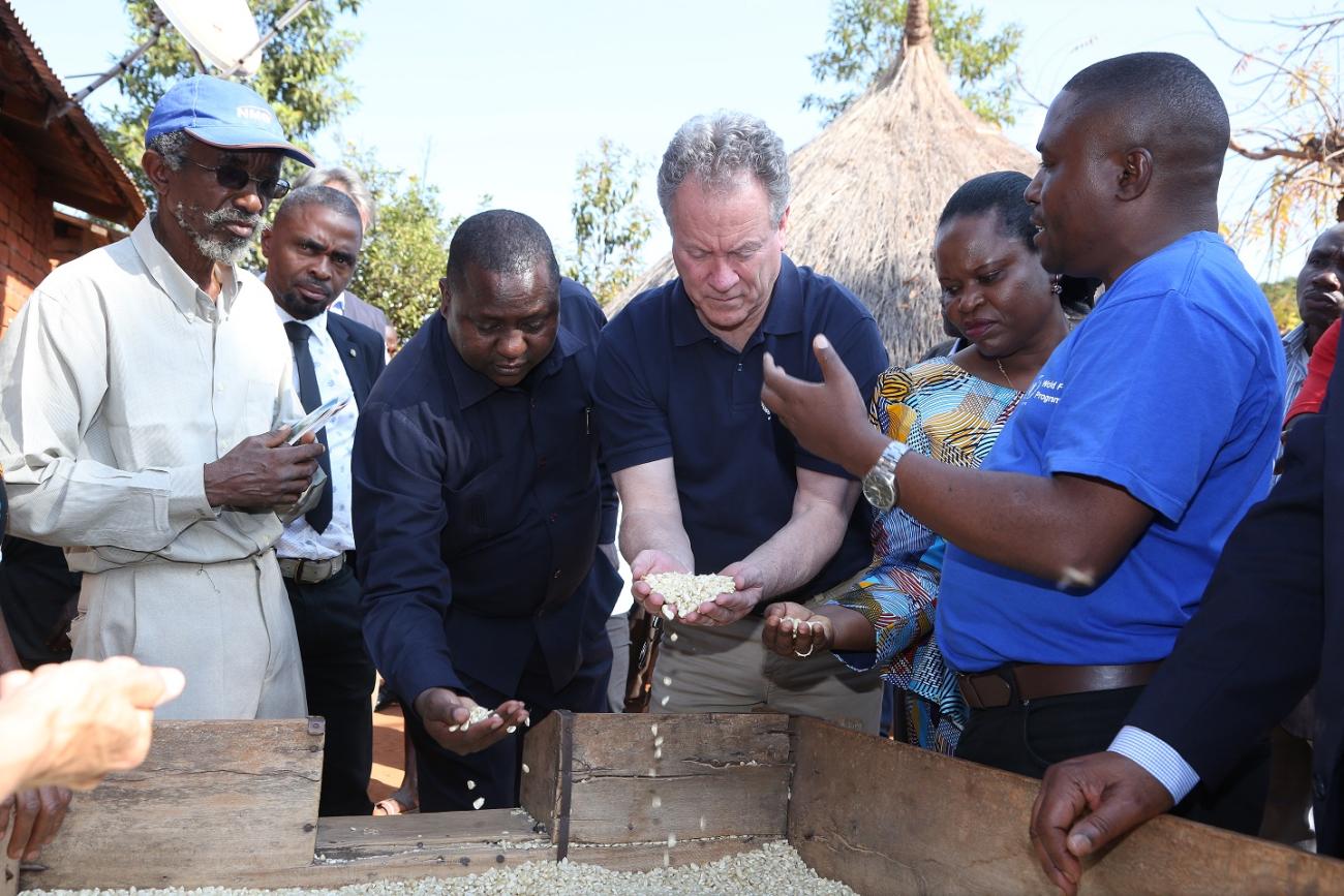 WFP Executive Director, Mr. David Beasley (centre) visits Farm to Market Alliance activities in Matimira Village, Songea Region.